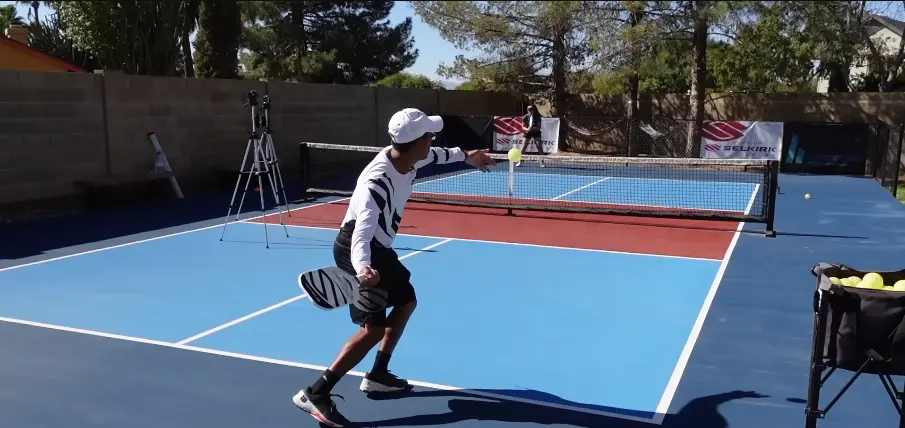 Player practicing pickleball self coaching in court
